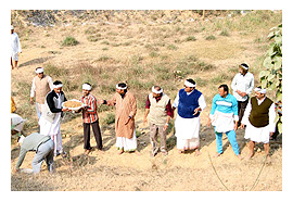 Sevak doing seva at Ashram