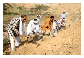 Disciple doing seva at Dham